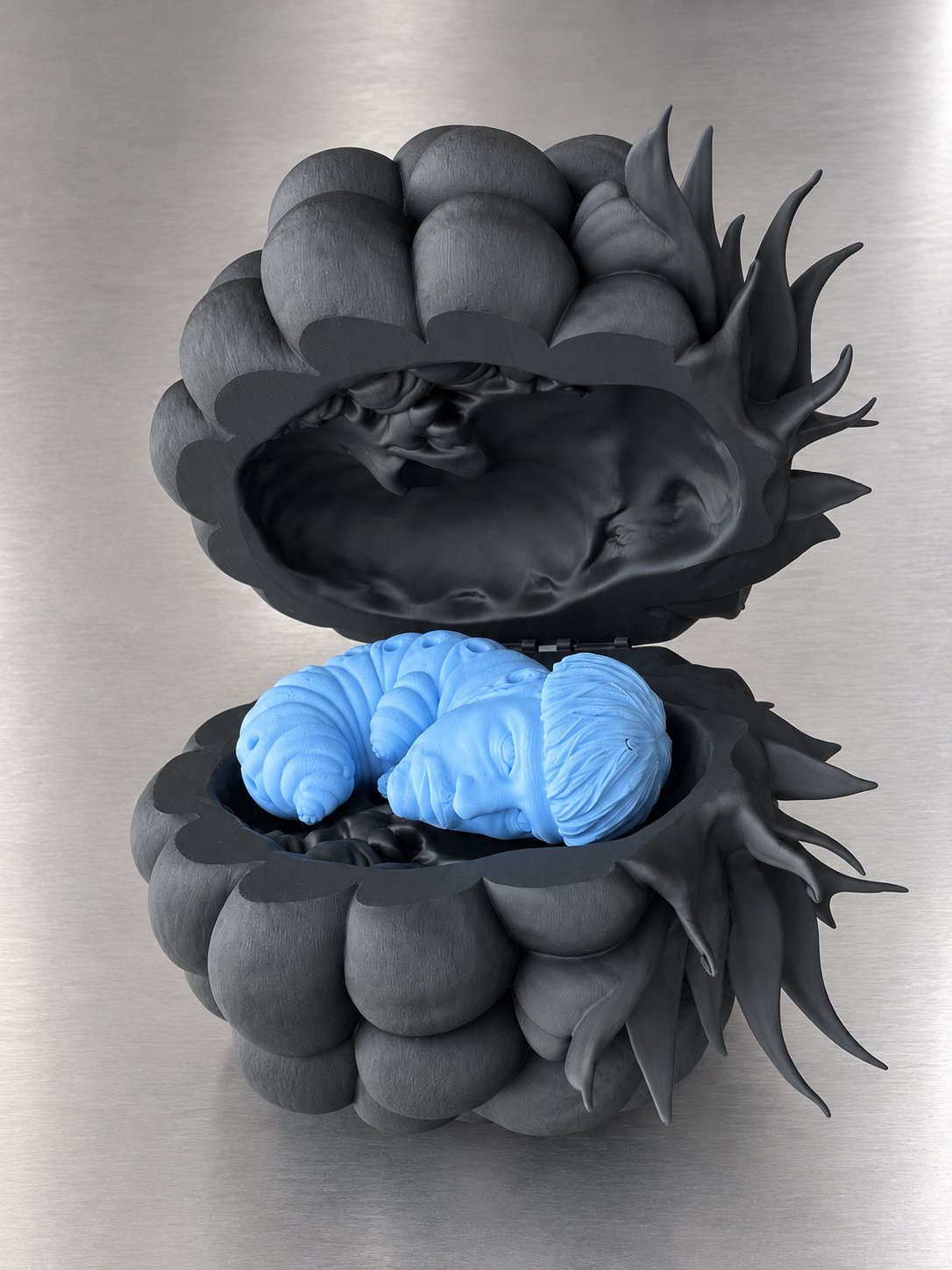 The open sculptural raspberry on aluminium