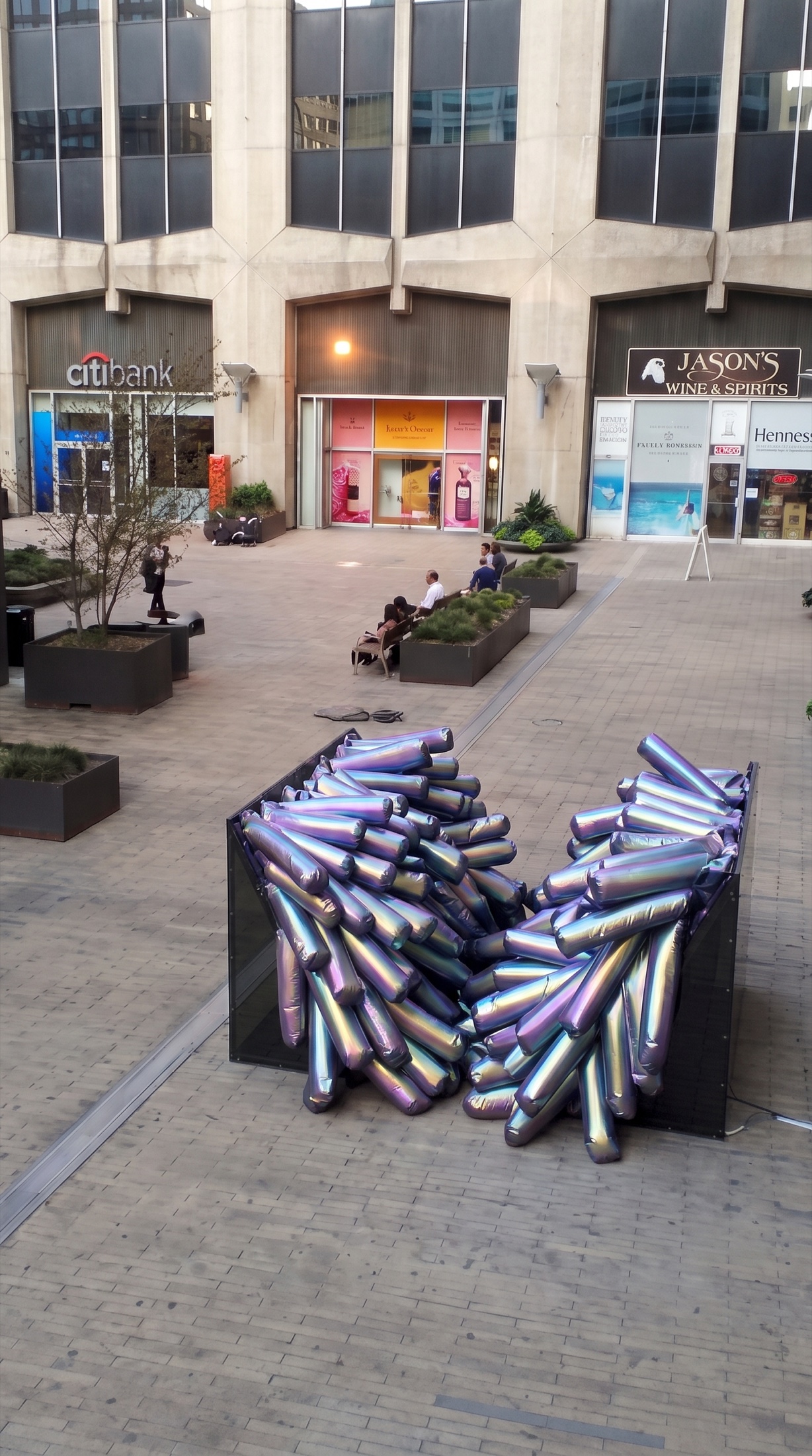 Elevated vertical view of 340 Tentacles with iridescent inflatable elements in the plaza