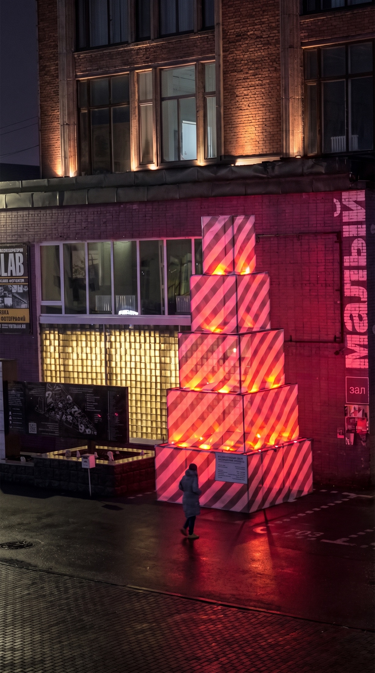 Night view of Christmas Tree Under Construction illuminated with red light
