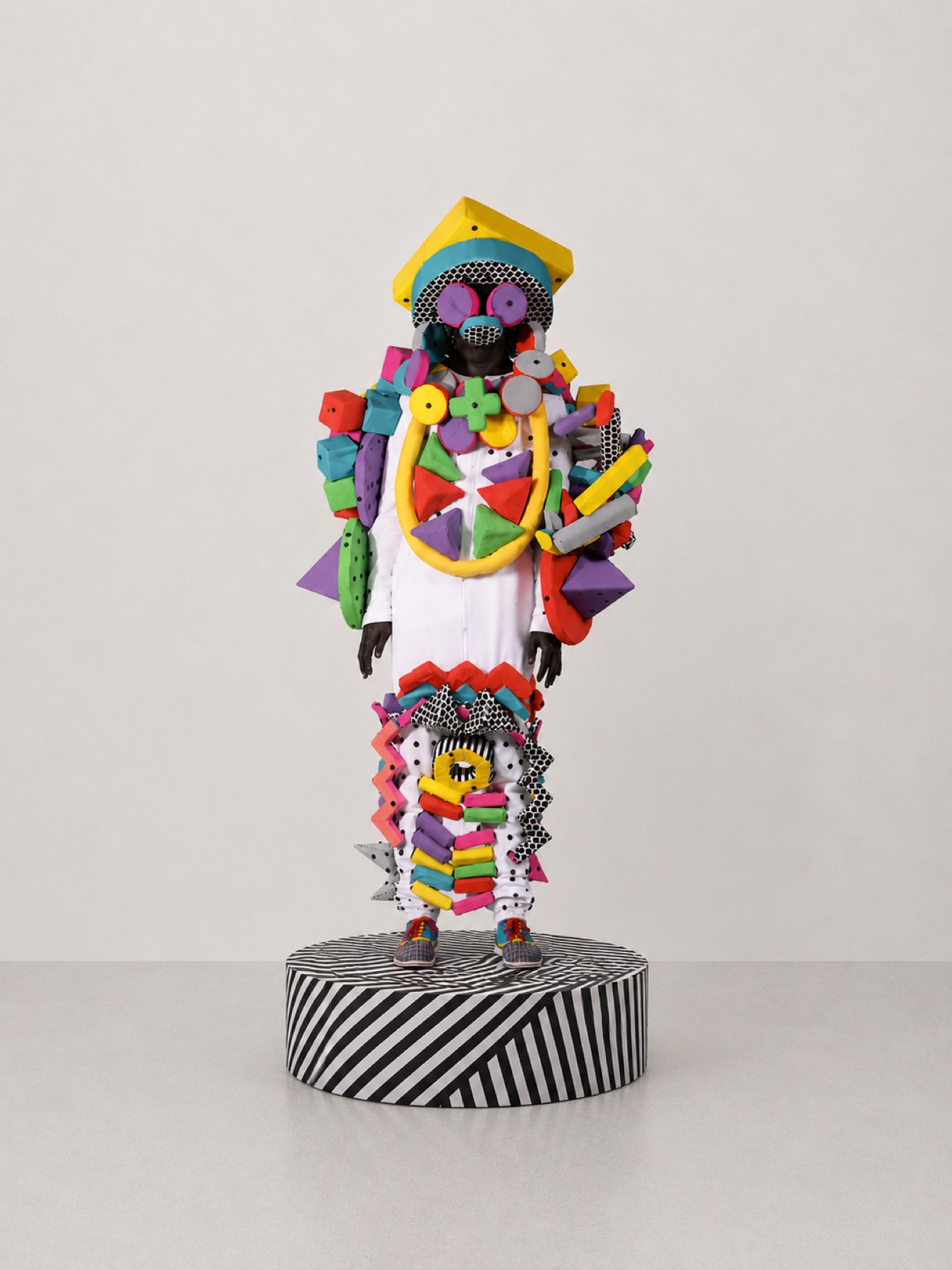 Full-body Human Kit wearable sculpture assembled from colorful soft components
