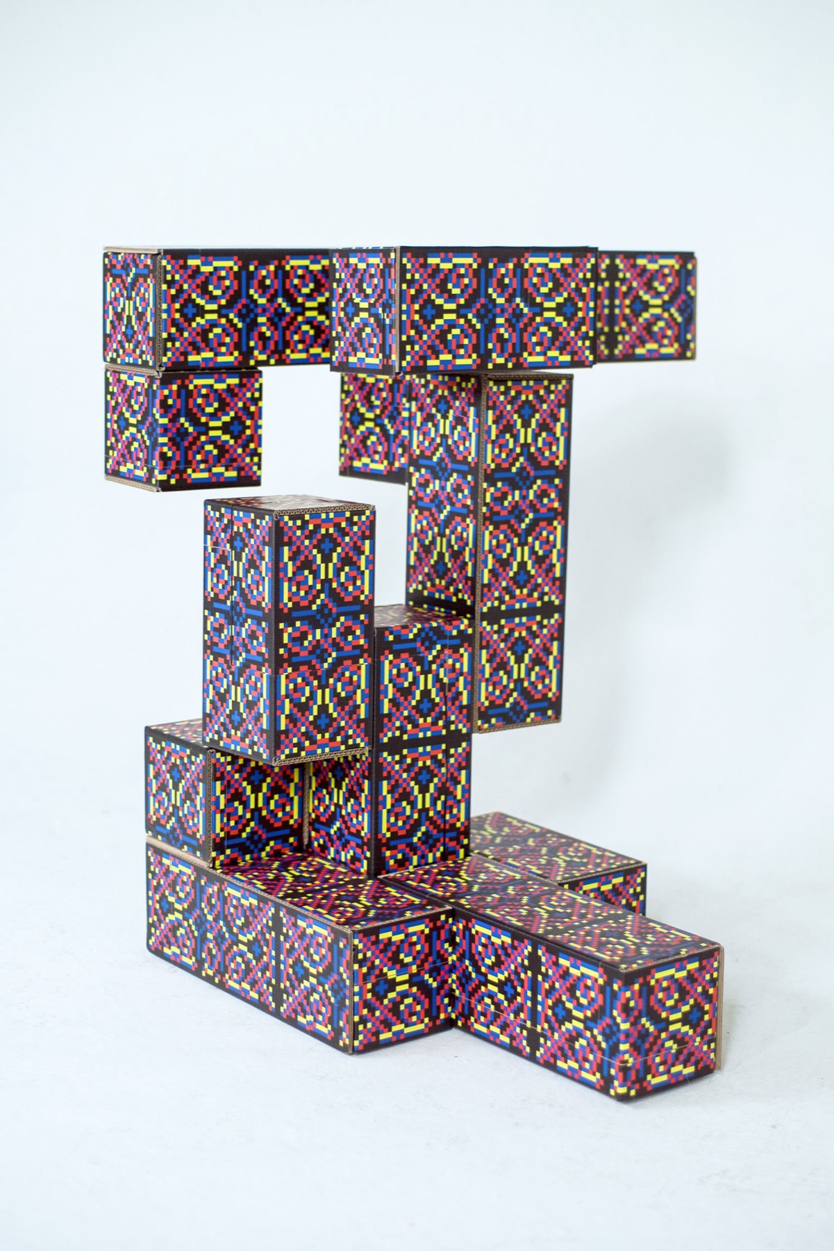 Vertical Pangan Tetris configuration made from patterned cardboard modules