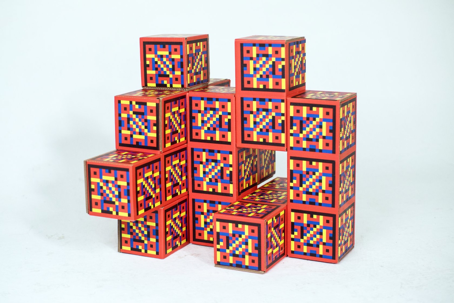 Red Pangan Tetris modules assembled into a compact sculptural configuration