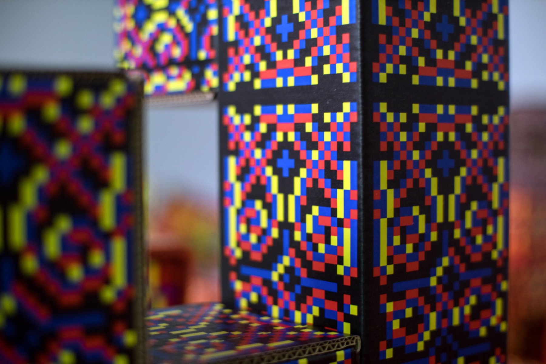 Close detail of a patterned Pangan Tetris cardboard module