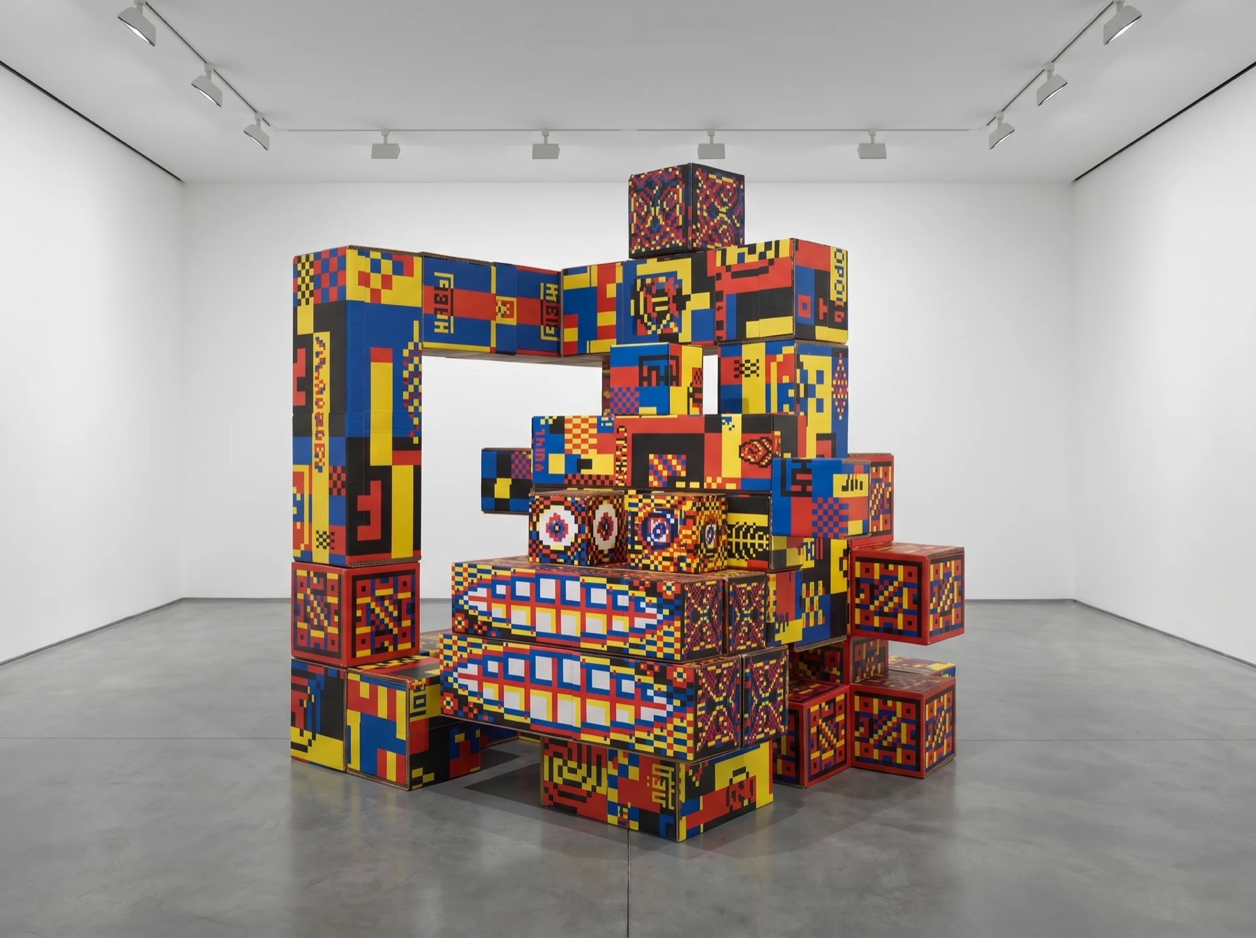Large Pangan Tetris construction viewed frontally in a gallery space