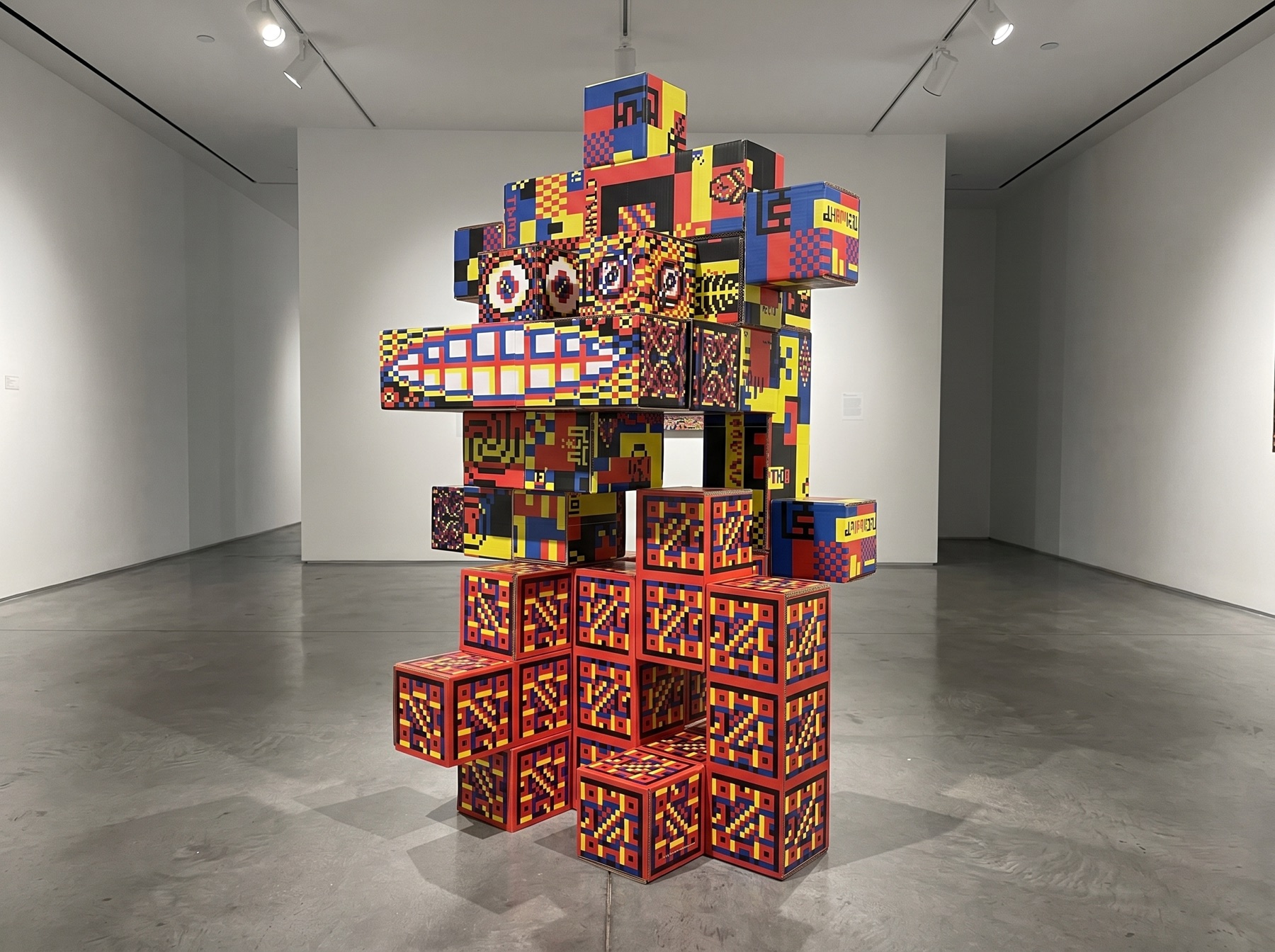 Pangan Tetris participatory sculpture assembled from colorful printed cardboard modules