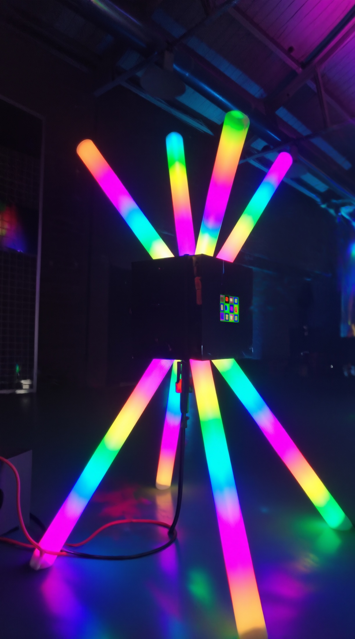 Compact POKE-N-CLICK with glowing tubes and button grid on the control box