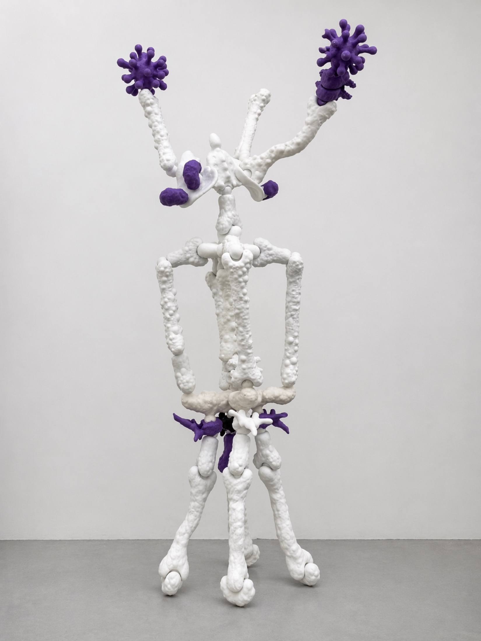 White skeletal Rebone organizm’os figure with purple virus-like elements
