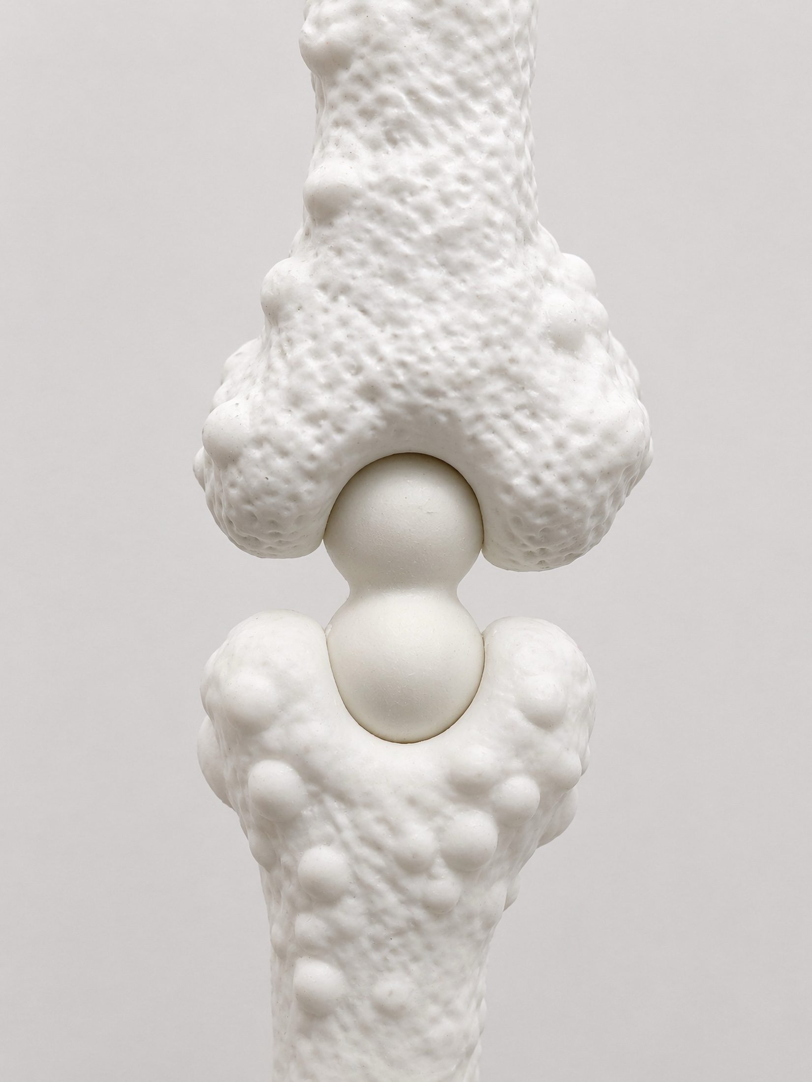 Close detail of a white Rebone organizm'os spherical joint